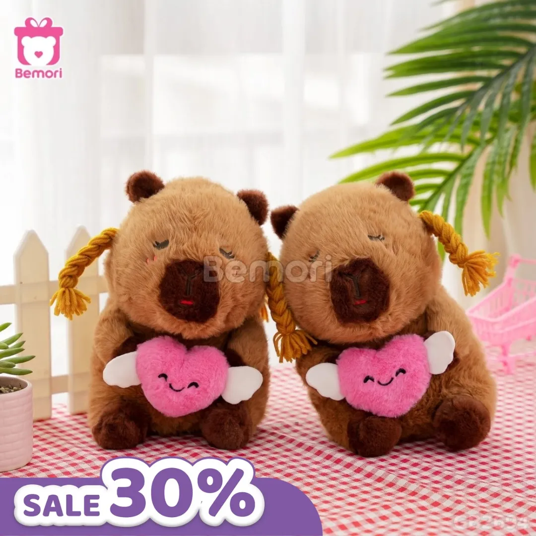 Gấu bông Capybara ôm tim nhỏ