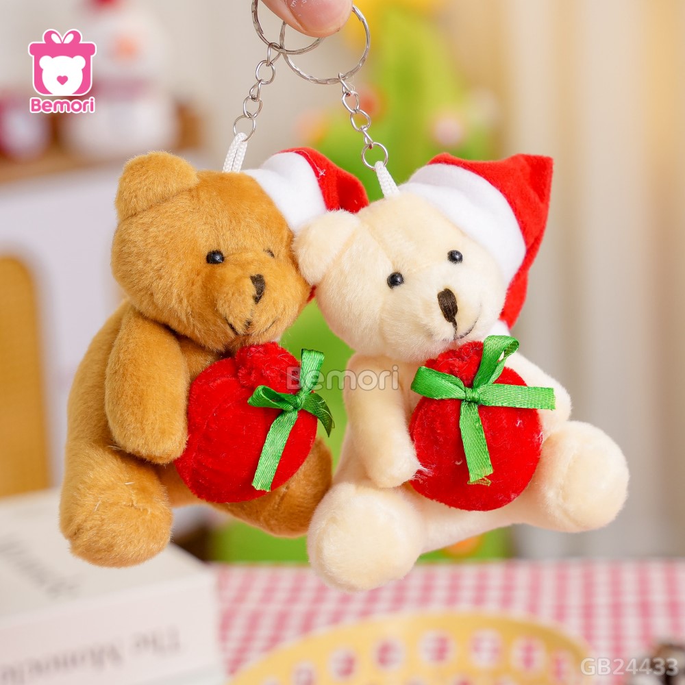 Móc Khóa Gấu Ôm Túi Đỏ Nơ Xanh
