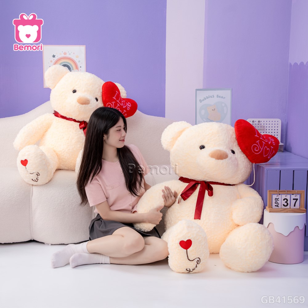 Gấu Bông Teddy Cầm Bóng Chân Tim