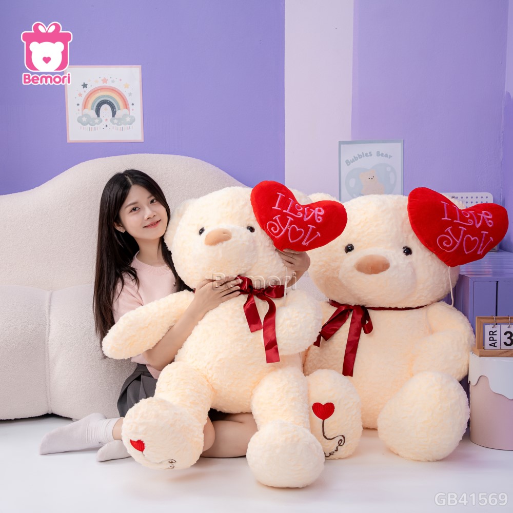 Gấu Bông Teddy Cầm Bóng Chân Tim