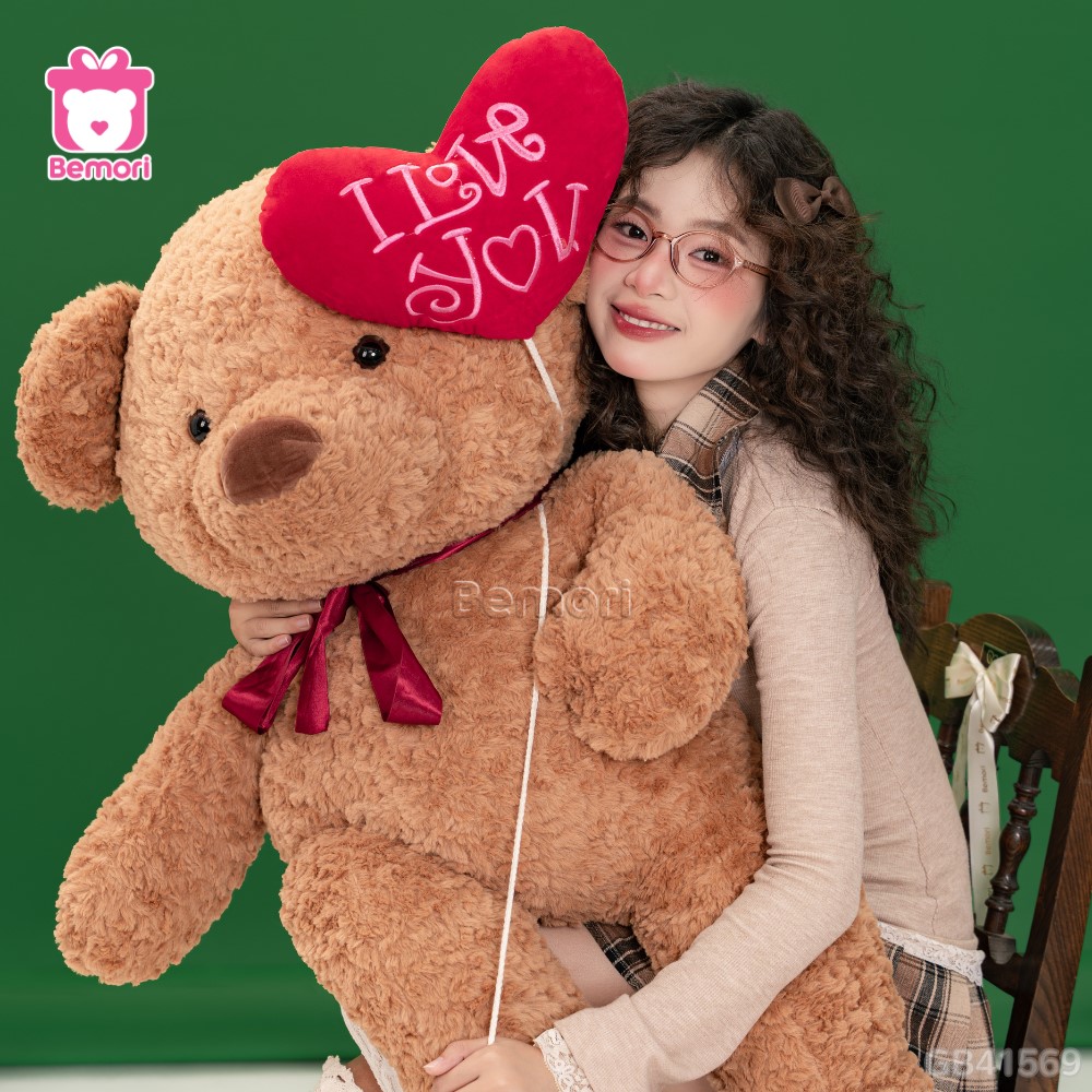 Gấu Bông Teddy Cầm Bóng Chân Tim