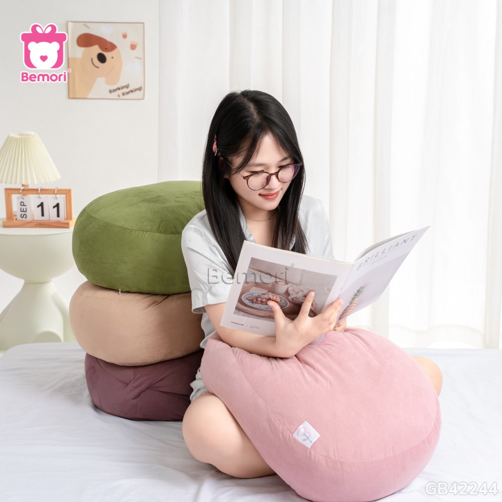 gối mochi da lộn kê tay khi đọc sách