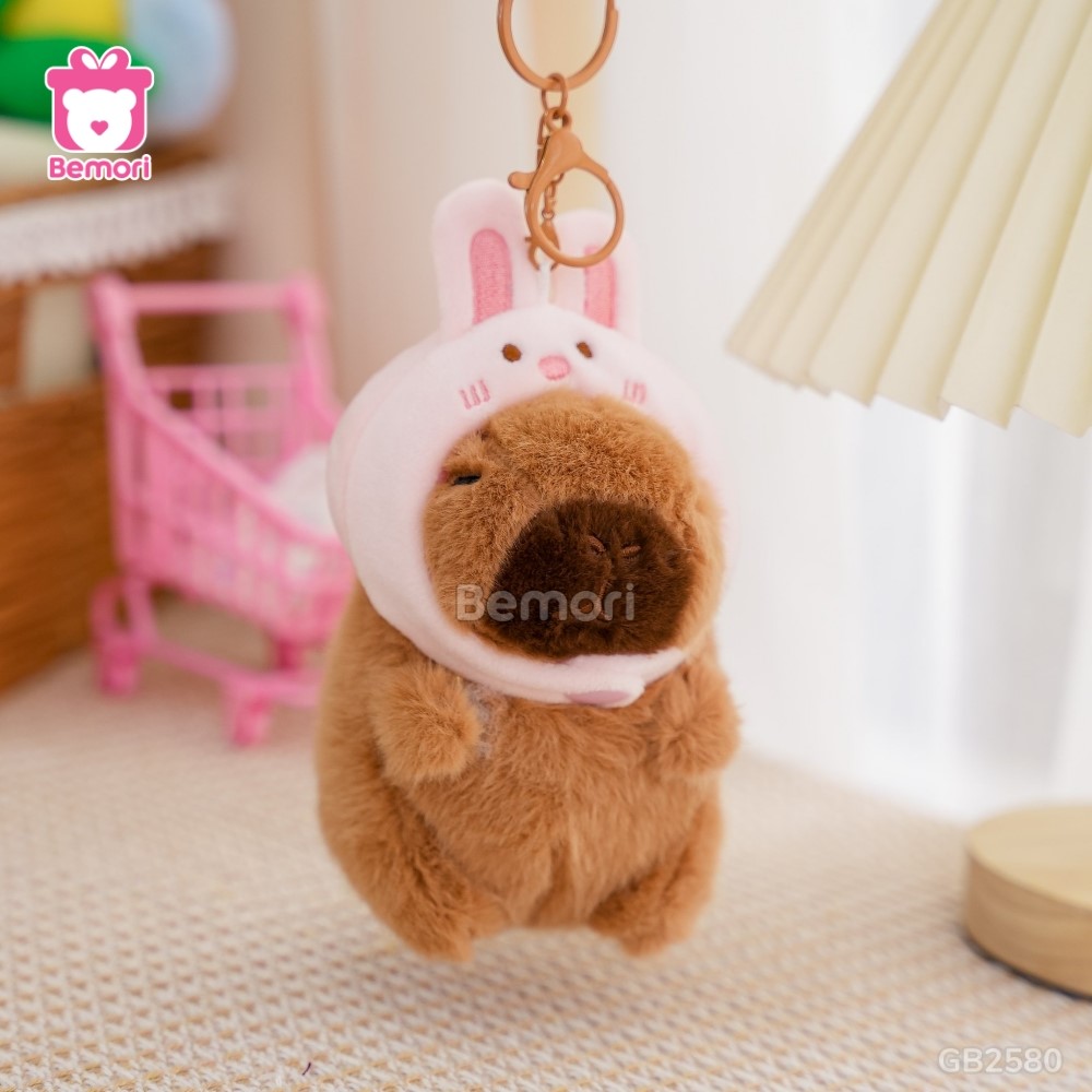 Móc Khóa Gấu Bông Capybara đội mũ thỏ xinh xắn