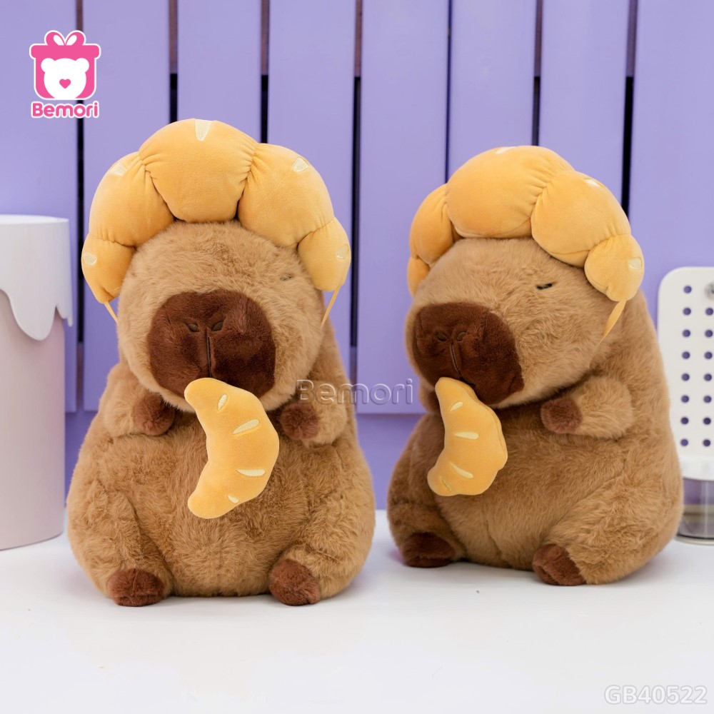 Gấu Bông Capybara Đội Bánh Sừng Bò