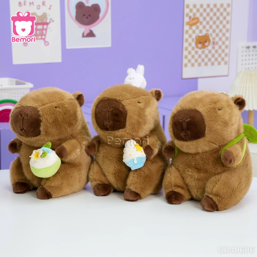 Gấu Bông Capybara Ôm Kem Đội Thỏ