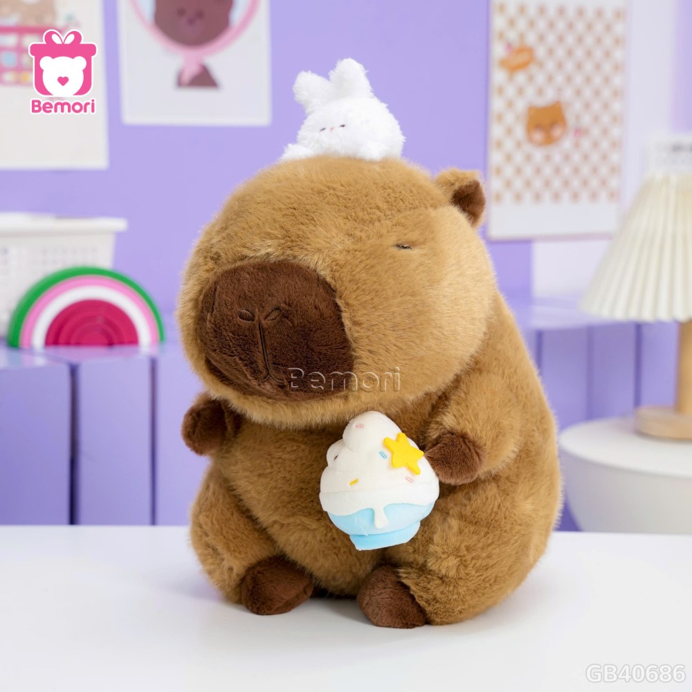 Gấu Bông Capybara Ôm Kem Đội Thỏ