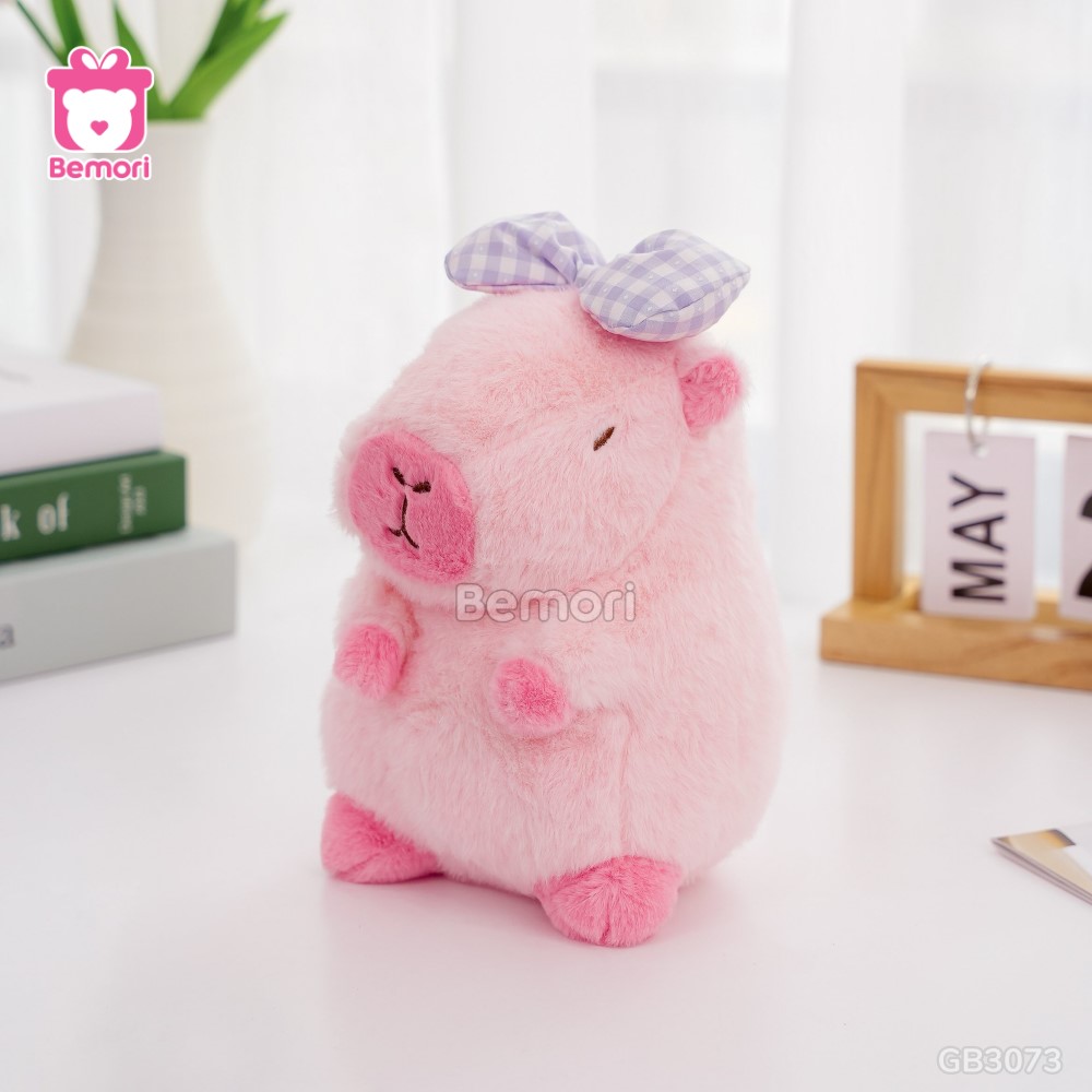 Gấu Bông Capybara Đeo Nơ Kẻ – Hồng Nhạt