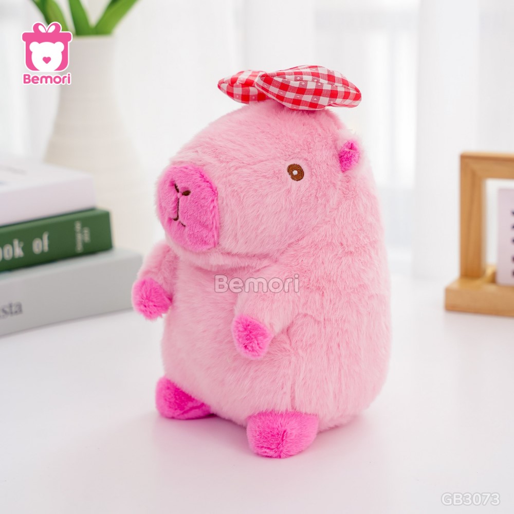 Gấu Bông Capybara Đeo Nơ Kẻ – Hồng Đậm