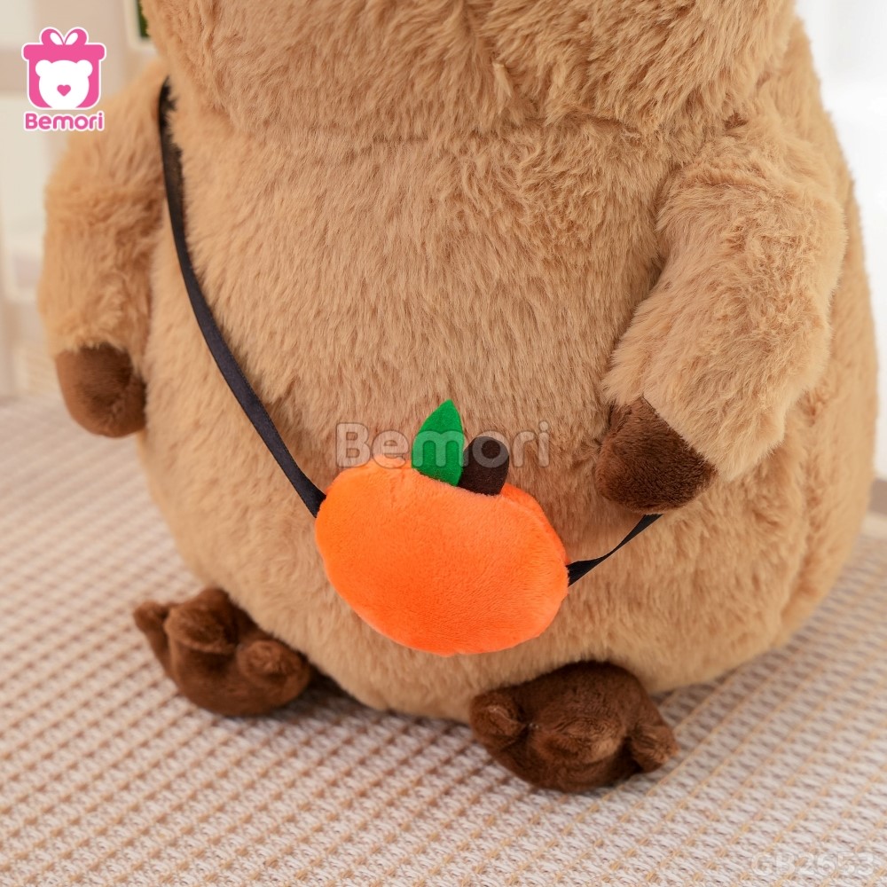 Gấu Bông Capybara Đội Vịt Đeo Túi Quả Cam dễ thương