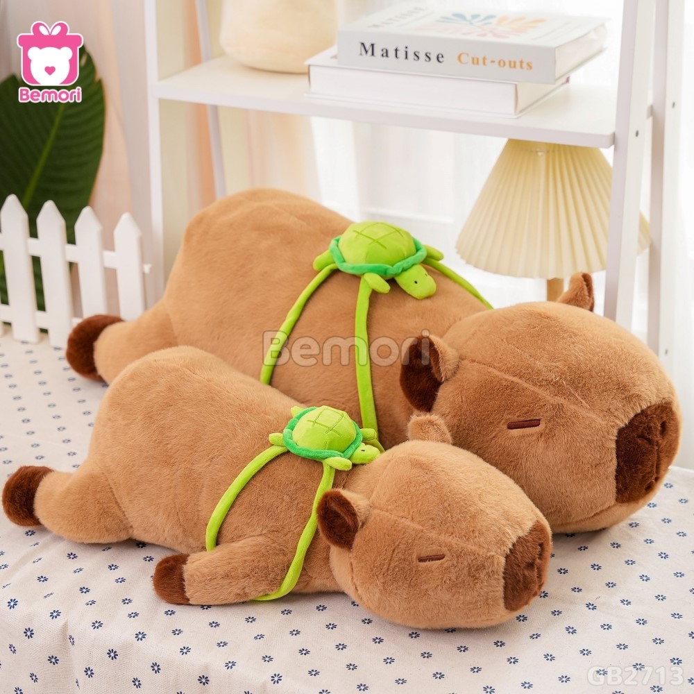 Gấu Bông Capybara Nằm Đeo Túi Rùa