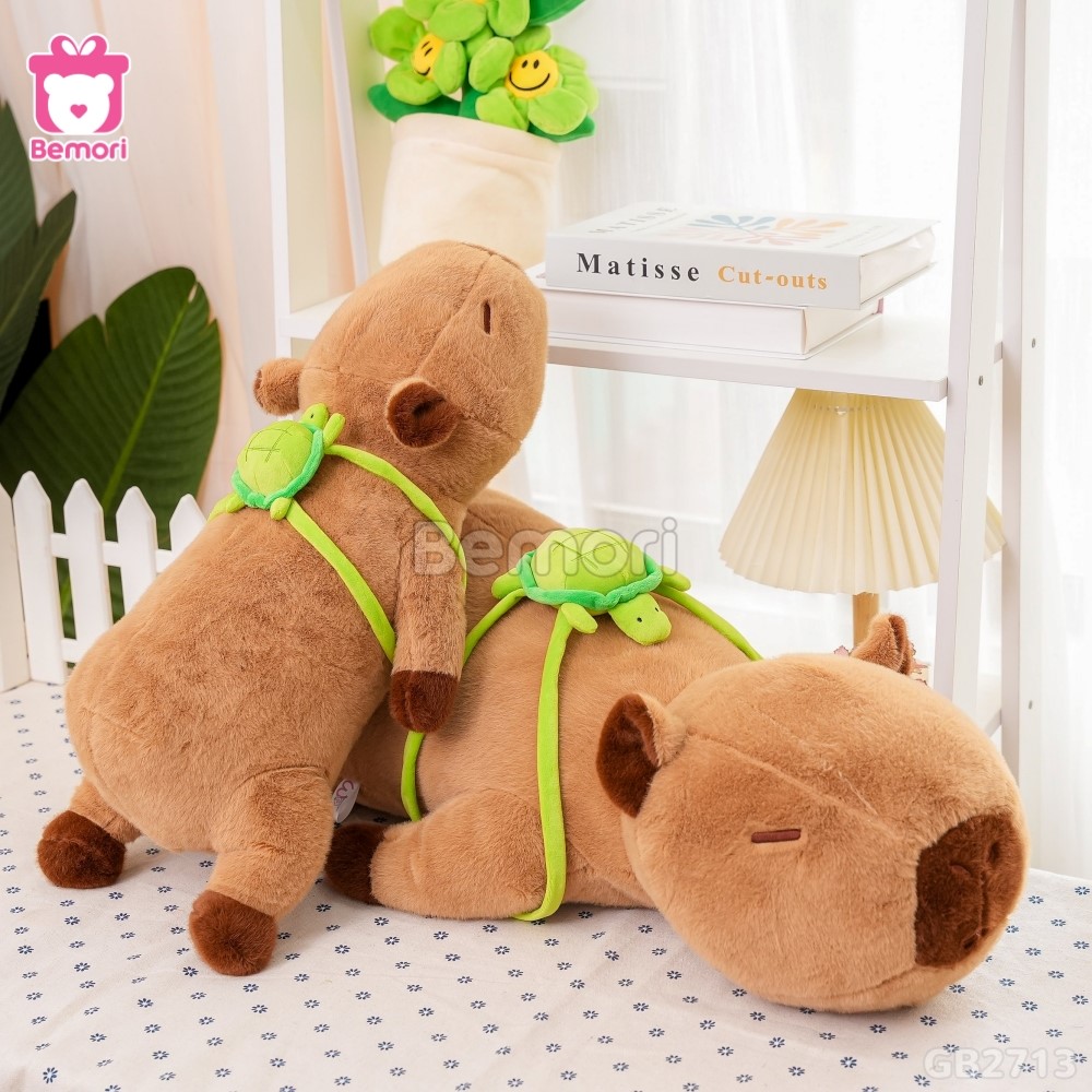 Gấu Bông Capybara Nằm Đeo Túi Rùa