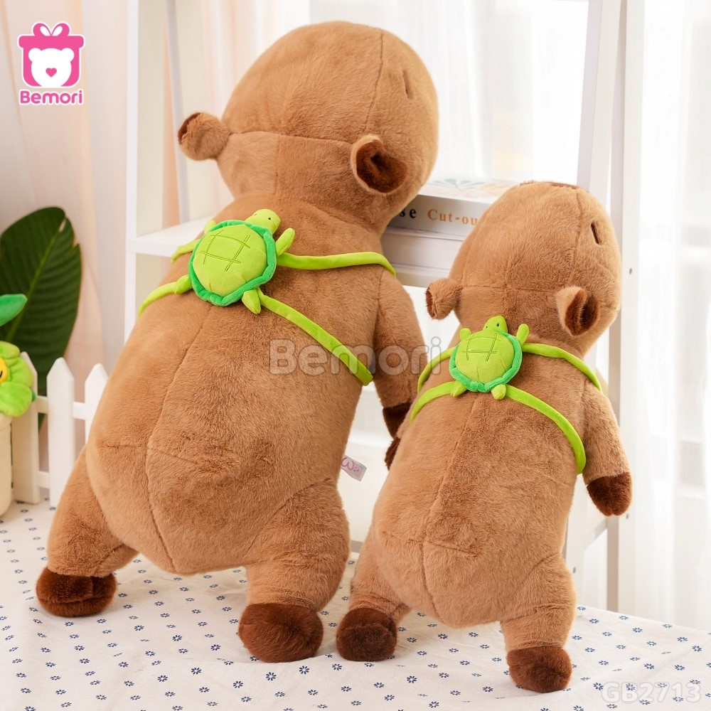 Gấu Bông Capybara Nằm Đeo Túi Rùa