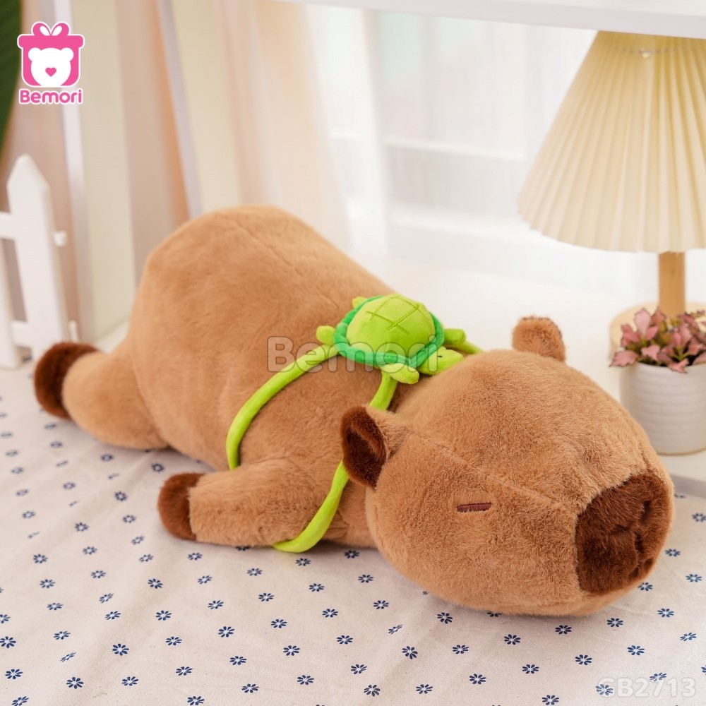 Gấu Bông Capybara Nằm Đeo Túi Rùa