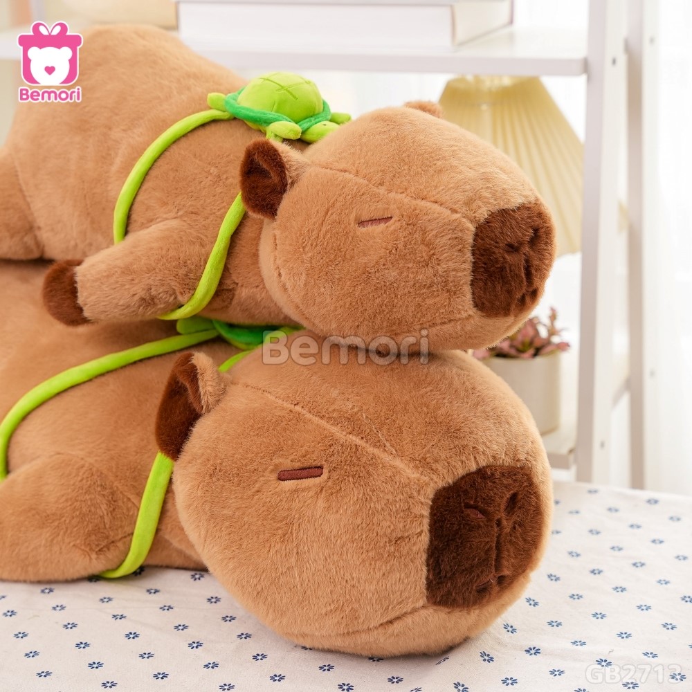 Gấu Bông Capybara Nằm Đeo Túi Rùa