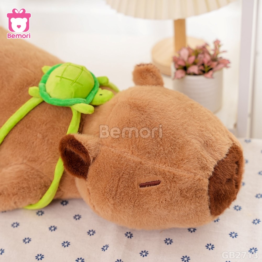 Gấu Bông Capybara Nằm Đeo Túi Rùa