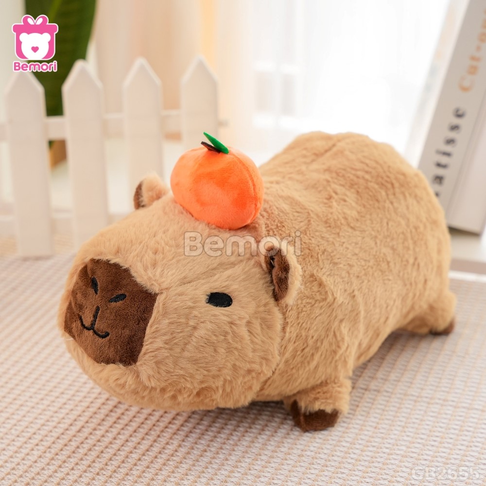 Gấu Bông Capybara Nằm Đội Quả Cam