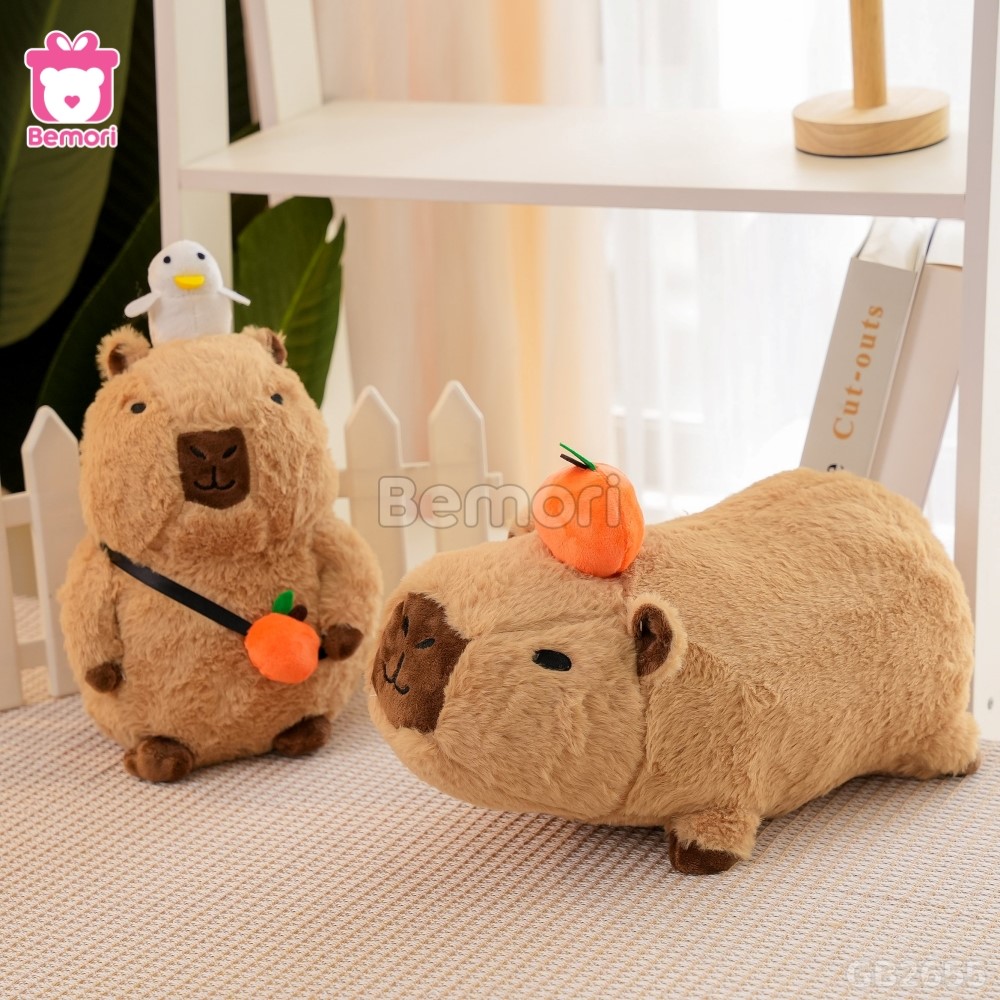 Gấu Bông Capybara Nằm Đội Quả Cam