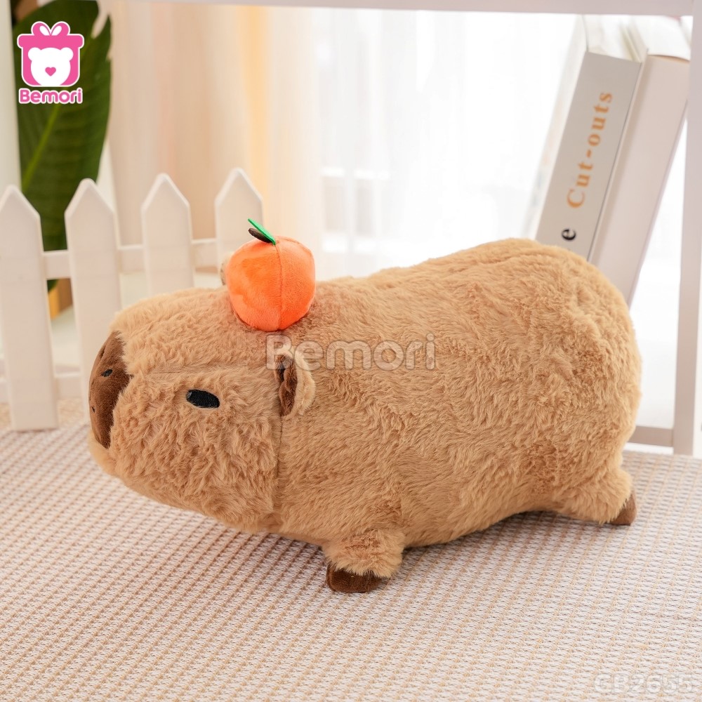 Gấu Bông Capybara Nằm Đội Quả Cam