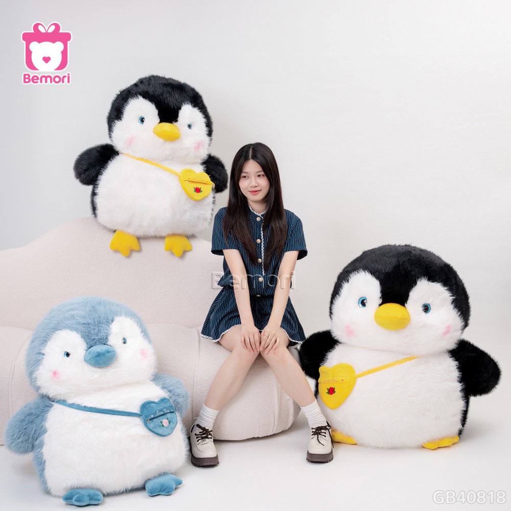 Cánh cụt bông mập mạp đeo túi