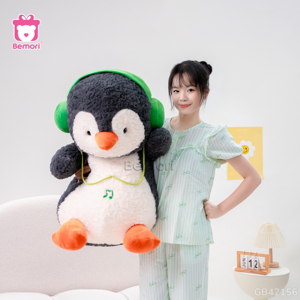 Gấu Bông Cánh Cụt Xám Đeo Tai Nghe Xanh Lá